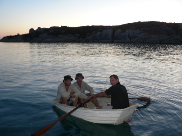 Water taxi - Phil takes Pete and James back to their camp on the beach after dinner on Sandpiper
