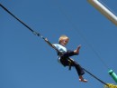 Tyler flying on the bungee trampoline