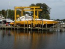 Owners boat here at the marina. Note the workers to get an idea of the size. With 4.400 HP, he gets to Florida in less than 3 days