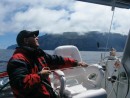 Steve trims a sail while passing Guadelupe Island