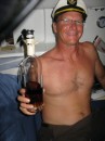 The captain passes around the rum as we cross the equator. 