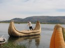 Man moving the dragon boat.