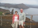 Gail & Tony at the top of Bartolome Island with Pinacle Rock in the background.