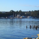 The small port of Strahan on Risby Cove,  Pt Macquarie. The 2 larger boats at the wharf take tourists 17nm up the Gordon River and out Hells Gates (weather permitting)