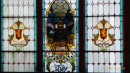The railway station features 2 of these stained glass windows - notice the sunlight shining through the gold headlight on the train.