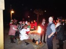 Outside in the cold by the fire, costumes and all, brave souls. (Fuego, Flagler Beach FL)