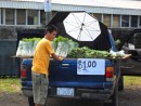 This Asian man is selling vebetables out of the back of his truck in Nuuuli. And yes, $1 means $1 U.S. since this is an American territory and so uses U.S. currency.