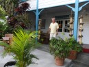 Jim stands on the front porch at the entrance to Sadie Thompson Inn bar and restaurant.