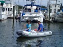 Our friends and marina neighbors Randy (right) and LeDean are taking advantage of this lovely late September weather to test their dinghy motor. (Rivers Edge Marina, St. Augustine, Florida)