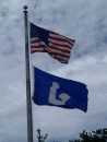 Two of our favorite flags are flying high at the library.