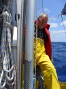 Jim in foul weather gear on voyage from San Diego to Nuku Hiva.