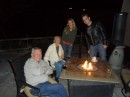 We enjoy a cool evening by the fire at a local restaurant with Jeff Mohney and Jill Kleeman (background). 