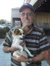 Friend Chuck Wise with his Papillion, Tiger, in front of Risky Business. 