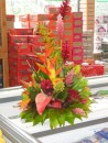 I cannot get enough of the gorgeous flower arrangements I have seen here in the Pacific islands. This one graces an ice cream cooler at K.S. Mart in Tafuna.