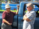 Portuguese Joe (left), owner of a long-line commercial fishing vessel, negotiates with Jim a price for our old radar system.