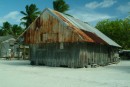 The Tin House was the home of William Marsters, an Englishman who founded the settlement on Palmerston Island with his three Polynesian wives in 1863. The structure was built with shipwreck timbers.