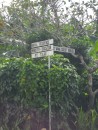 I pass this road sign (with Port Wine Guest House partially obscured) after passing the police station and turning left onto the road to the bakery.