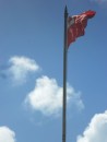 The Tongan flag flies proudly above the police station.