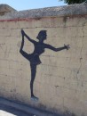 Oddly enough, a figure skater holds a prominent place in the mural.