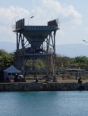 Barahona may be a small port, but it is nonetheless very much a commercial port. (Pictured here, a giant coal chute where ships unload their coal beside the small anchorage.