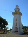 ALONG A WALK TO THE MARKET: This clock tower, which sits downtown on the Beach Road diagonally across the street from the Chang Won Department Store (supermarket), is a landmark in Apia.  