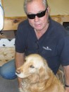 Linda, the Irish Sail Lady, and her husband Tom are great animal lovers, and Jim cannot resist giving some love to their golden retriever, Genny, before we depart.