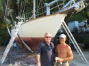 Jim and Thom, our new German friend, pose in front of his boat.