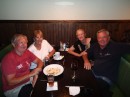 John and Ann Dixon (left) with Ann and Jim at a farewell dinner for the Dixons at Taps. 