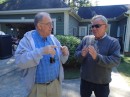 Outside, Bill and Jim discuss how they are going to repair the automatic garage door opener. (And yes, they do manage to do so before we leave.)