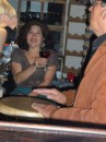 Charly plays drums while Esperanza enjoys the music at La Cueva.