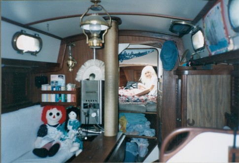 Carly in the V Berth of Cssiopeia as the warm Samoan sun streams in