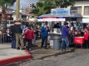 Locals eating at one of the many Baja Fish Taco stands all over town. Lunch for two: $4 US!