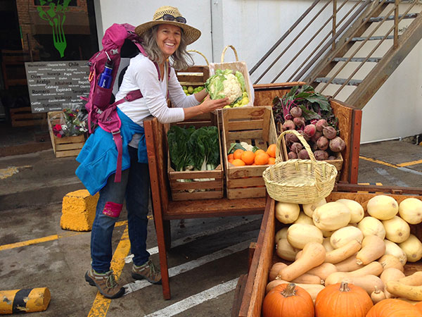 Heidi shopping at the organic produce market, just look at the size of the cauliflower!