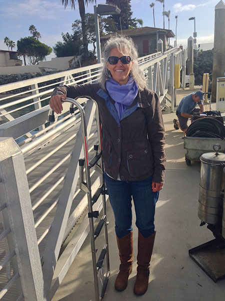 Heidi with our new boarding-swim ladder, it will be great to finally have a way to get back onboard from the water...once we get to someplace warm enough to actually get into the water!