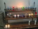 Colorful votive candles light up the Mission of San Javier.