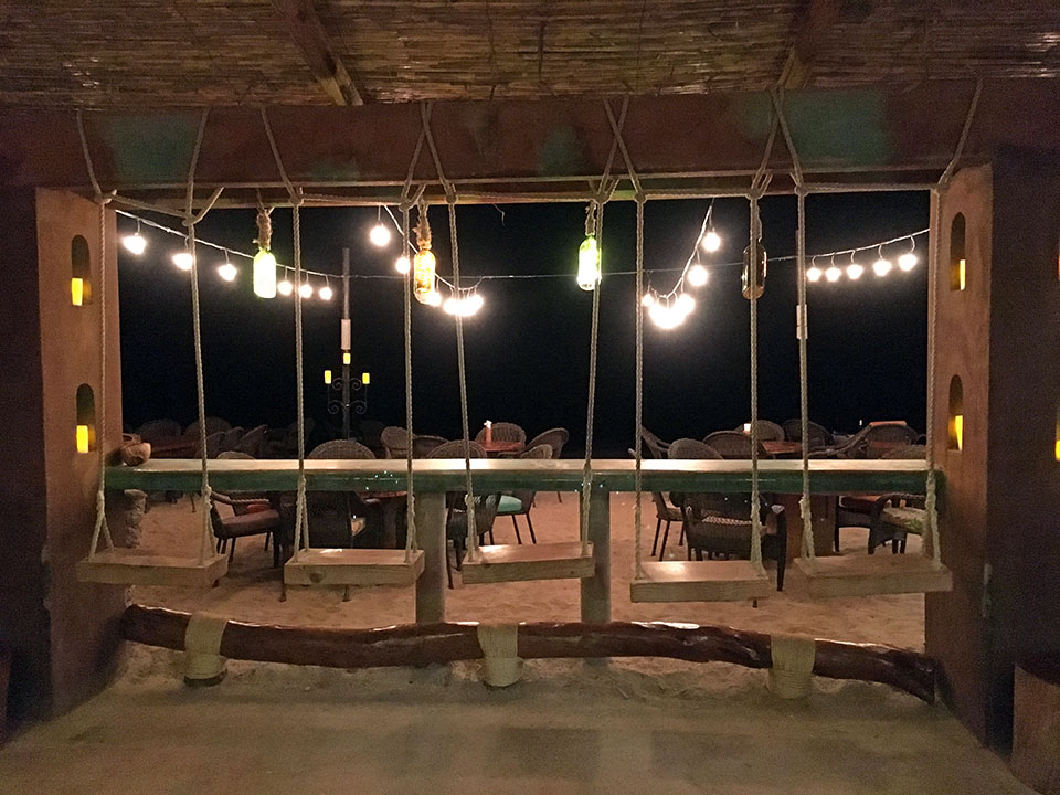 Fun adult swings at the bar at Sunset Grill, Playa Algodones. If you