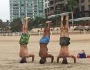 Boot Camps and exercise programs happen on the beach most evenings. These head-stand dudes practiced for over an hour until they were finally all lined up together...then they had to go home and "wash that sand right outta their hair!"
