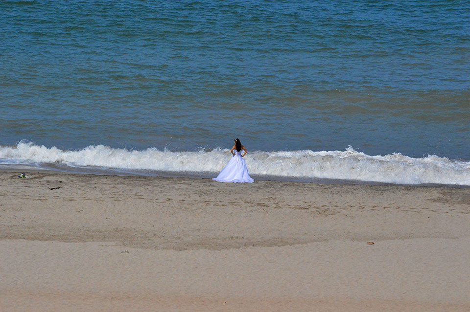A bride on the beach...Beautiful.