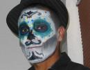 Amazing! The richly colorful detail and intricate design in the Day of the Dead face paint on this student.