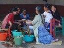 A family preparing a meal of Carundas - Santa Fe de la Laguna
