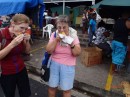 Shelia (Never Bored) Margi eating Doubles at  the Port of Spain Market