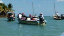 We decided to go to Les Cayes on the mainland to check in to the country. We took one of these water taxis across the large body of water.  It was a real experience. When the water started getting sprayed on us they pulled a tarp over everyone.
