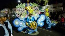 This was one of our favorite floats. The parader carries it on their shoulders, this guy is actually standing upright and walking but it looks like he is sitting down.