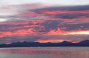 Sunset: Sun setting behind Loreto, about 10 miles from our anchorage.