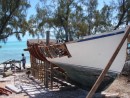 The famous Bahamian sailing ship Miss Muriel under reconstruction in Staniel Cay.