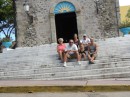 Connie, Bruce, Sandwich, Buck, Randy and Fuego on the steps on a church in Les Saintes