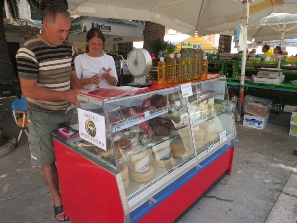 Vis town market stall selling cheese, salami and olive oil. Tastings encouraged!