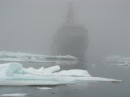 Norwegian Coast Guard ship Senja approaching out of the fog on radar.