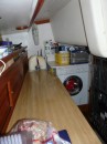 Aft cabin starboard side.  The work bench, storage, and the wonderful washer/dryer