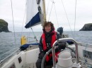 Sandi looking relieved as we reach calm waters between Berneray and Mingulay